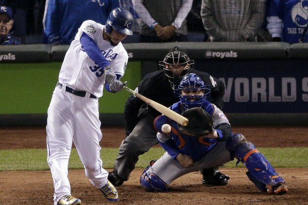 Kansas City Royals' Eric Hosmer hits a two-RBI single against the New York Mets during the fifth inning of Game 2 of the Major League Baseball World Series Wednesday, Oct. 28, 2015, in Kansas City, Mo. (AP Photo/Charlie Riedel)