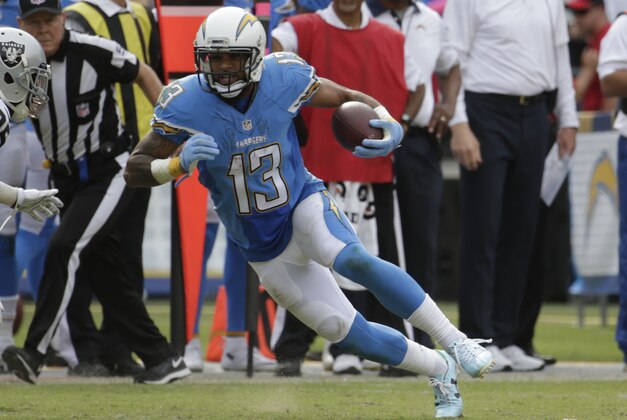 San Diego Chargers wide receiver Keenan Allen, right, runs after a reception as Oakland Raiders cornerback D.J. Hayden defends during the second half of an NFL football game Sunday, Oct. 25, 2015, in San Diego. (AP Photo/Lenny Ignelzi)