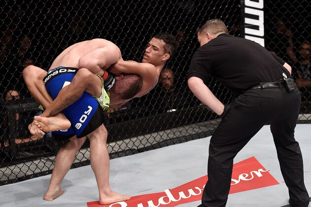 GOIANIA, BRAZIL - MAY 30:  Charles Oliveira attempts to submit Nick Lentz of the United States in their featherweight UFC bout during the UFC Fight Night event at Arena Goiania on May 30, 2015 in Goiania, Brazil.  (Photo by Buda Mendes/Zuffa LLC/Zuffa LLC via Getty Images)