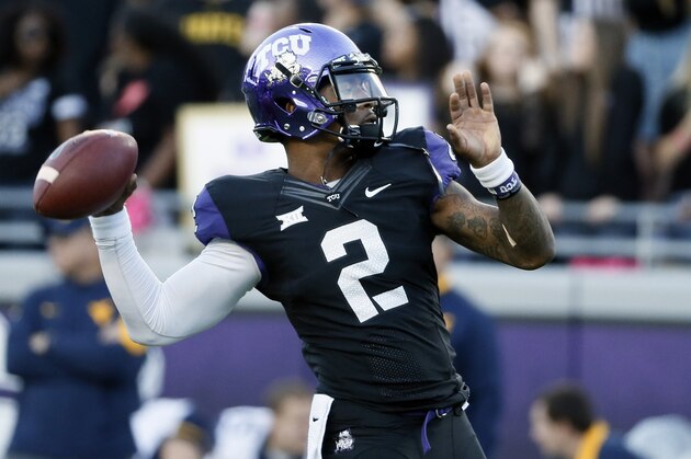 TCU quarterback Trevone Boykin throws during warm ups before an NCAA college football game against West Virginia Thursday, Oct. 29, 2015, in Fort Worth, Texas. (AP Photo/Tony Gutierrez)
