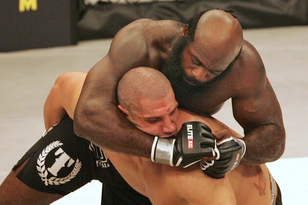 Kimbo Slice, top, has James Thompson of Manchester, England in a head lock during the second round of their EliteXC heavyweight bout at the Prudential Center in Newark, N.J. Saturday, May 31, 2008. Slice won in the third round on a TKO. (AP Photo/Rich Schultz)