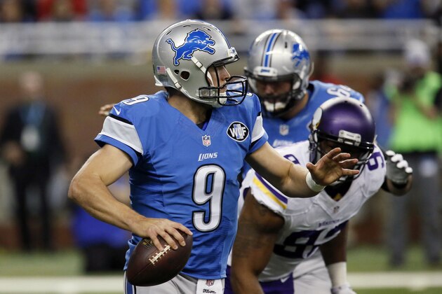Detroit Lions quarterback Matthew Stafford (9) is pressured during the first half of an NFL football game against the Minnesota Vikings, Sunday, Oct. 25, 2015, in Detroit. (AP Photo/Duane Burleson) Detroit Lions quarterback Matthew Stafford (9) is pressured during the first half of an NFL football game against the Minnesota Vikings, Sunday, Oct. 25, 2015, in Detroit. (AP Photo/Duane Burleson)