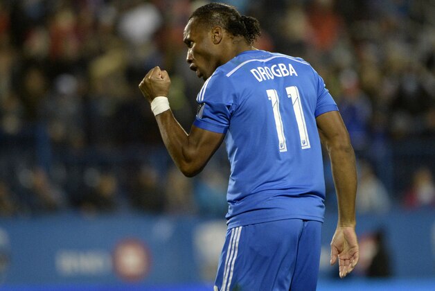 Oct 25, 2015; Montreal, Quebec, CAN; Montreal Impact forward Didier Drogba (11) reacts after scoring a goal against the Toronto FC during the second half at Stade Saputo. Mandatory Credit: Eric Bolte-USA TODAY Sports