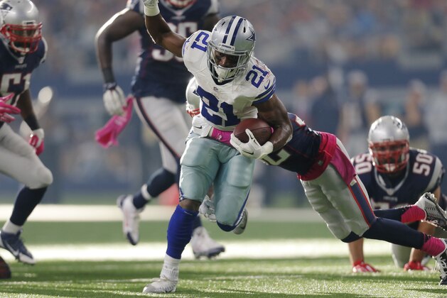 Dallas Cowboys' Joseph Randle (21) runs against the New England Patriots during the second half of an NFL football game, Sunday, Oct. 11, 2015, in Arlington, Texas. (AP Photo/Brandon Wade)