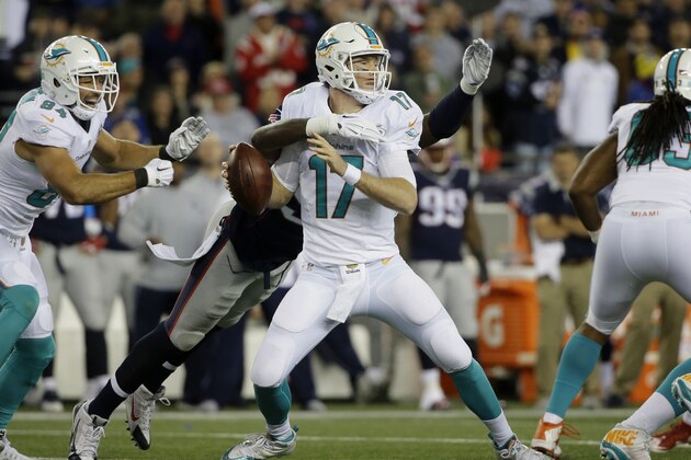 New England Patriots defensive end Chandler Jones (95) sacks Miami Dolphins quarterback Ryan Tannehill (17) in the first half an NFL football game, Thursday, Oct. 29, 2015, in Foxborough, Mass. (AP Photo/Steven Senne)