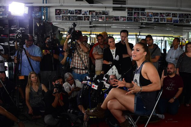 Mixed Martial Arts (MMA) fighter Ronda Rousey responds to questions during media day in Glendale, California on October 27, 2015 ahead of her November 14 fight in Melbourne, Australia against Holly Holm. AFP PHOTO / FREDERIC J. BROWN        (Photo credit should read FREDERIC J. BROWN/AFP/Getty Images)