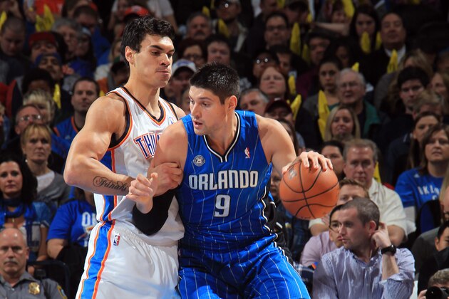 OKLAHOMA CITY, OK - DECEMBER 15: Nikola Vucevic #9 of the Orlando Magic backs up to the basket against the Oklahoma City Thunder during an NBA game on December 15, 2013 at the Chesapeake Energy Arena in Oklahoma City, Oklahoma. NOTE TO USER: User expressly acknowledges and agrees that, by downloading and or using this Photograph, user is consenting to the terms and conditions of the Getty Images License Agreement. Mandatory Copyright Notice: Copyright 2013 NBAE (Photo by Layne Murdoch/NBAE via Getty Images)