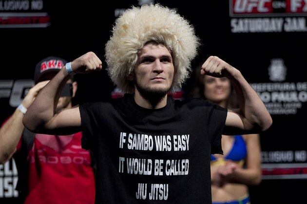 Fighter Khabib Nurmagomedov from the US gestures as he weighs-in for the Ultimate Fighting Championship, UFC, in Sao Paulo, Brazil, Friday, Jan. 18, 2013. Nurmagomedov will compete in UFC in Sao Paulo on Jan. 19. (AP Photo/Andre Penner)