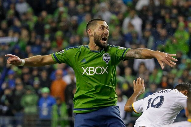 Seattle Sounders' Clint Dempsey reacts to a play in the second half of an MLS soccer western conference knockout round playoff match against the Los Angeles Galaxy, Wednesday, Oct. 28, 2015, in Seattle. The Sounders beat the Galaxy 3-2. (AP Photo/Ted S. Warren)