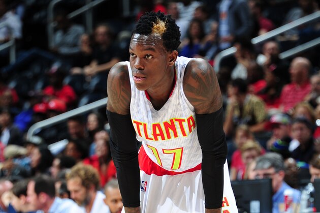 ATLANTA, GA - OCTOBER 14:  Dennis Schroder #17 of the Atlanta Hawks looks on during the game against the San Antonio Spurs on October 14, 2015 at Philips Arena in Atlanta, Georgia.  NOTE TO USER: User expressly acknowledges and agrees that, by downloading and/or using this Photograph, user is consenting to the terms and conditions of the Getty Images License Agreement. Mandatory Copyright Notice: Copyright 2015 NBAE (Photo by Scott Cunningham/NBAE via Getty Images)