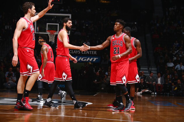 BROOKLYN, NY - OCTOBER 28:  Jimmy Butler #21 of the Chicago Bulls shakes hands with Nikola Mirotic #44 of the Chicago Bulls against the Brooklyn Nets on October 28, 2015 at Barclays Center in Brooklyn, New York. NOTE TO USER: User expressly acknowledges and agrees that, by downloading and or using this Photograph, user is consenting to the terms and conditions of the Getty Images License Agreement. Mandatory Copyright Notice: Copyright 2015 NBAE (Photo by Nathaniel S. Butler/NBAE via Getty Images)
