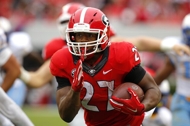 ATHENS, GA - SEPTEMBER 26: Running back Nick Chubb #27 of the Georgia Bulldogs rushes in for a touchdown in the third quarter of the game against the Southern University Jaguars on September 26, 2015 at Sanford Stadium in Athens, Georgia. The Georgia Bulldogs won 48-6. (Photo by Todd Kirkland/Getty Images)