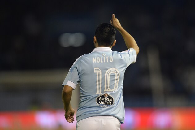 Celta Vigo's forward  Nolito points skywards during the Spanish league football match Celta Vigo vs Getafe CF at the Balaidos stadium in Vigo on October 2, 2015.   AFP PHOTO / MIGUEL RIOPA        (Photo credit should read MIGUEL RIOPA/AFP/Getty Images)