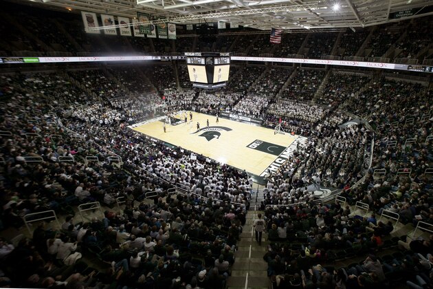 Michigan State and Penn State play during the first half of an NCAA college basketball game, Wednesday, Jan. 21, 2015, in East Lansing, Mich. The game was the 400th at the Breslin Center. Michigan State won 66-60. (AP Photo/Al Goldis)