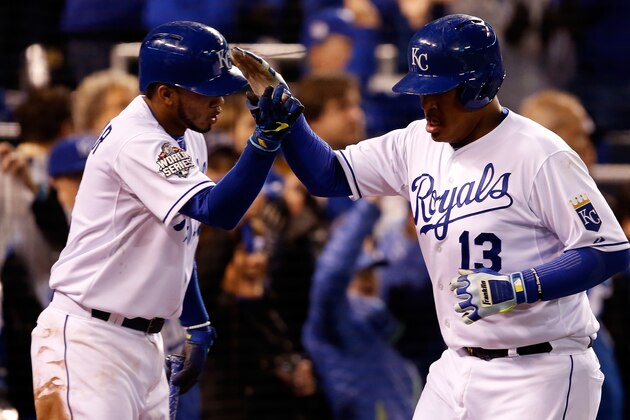 KANSAS CITY, MO - OCTOBER 28:  Salvador Perez #13 of the Kansas City Royals celebrates with Alcides Escobar #2 of the Kansas City Royals after scoring a run in the eighth inning against the New York Mets in Game Two of the 2015 World Series at Kauffman Stadium on October 28, 2015 in Kansas City, Missouri.  (Photo by Sean M. Haffey/Getty Images)