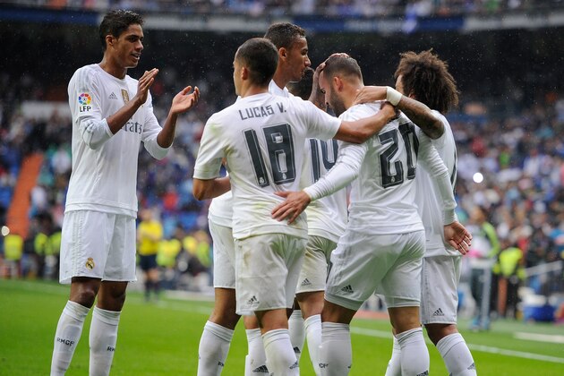 MADRID, SPAIN - OCTOBER 17:  Rafael Varane of Real Madrid applauds after Jese Rodriguez scored Real's 3rd goal during the La Liga match between Real Madrid CF and Levante UD at estadio Santiago Bernabeu on October 17, 2015 in Madrid, Spain.  (Photo by Denis Doyle/Getty Images)
