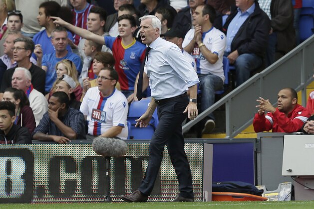 Crystal Palace manager Alan Pardew shouts across the pitch during the English Premier League soccer match between Crystal Palace and Manchester City at Selhurst Park, London, Saturday, Sept. 12, 2015. (AP Photo/Tim Ireland)