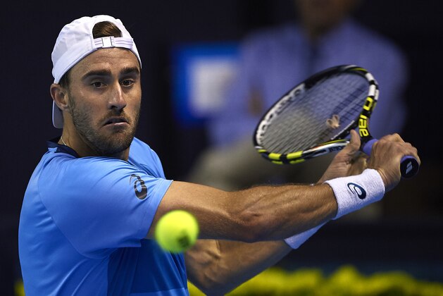 VALENCIA, SPAIN - OCTOBER 30:  Steve Johnson of the United States returns a shot to Guillermo Garcia-Lopez of Spain  during day five of the ATP World Tour Valencia Open tennis tournament at the Ciudad de las Artes y las Ciencias on October 30, 2015 in Valencia, Spain.  (Photo by Manuel Queimadelos Alonso/Getty Images)
