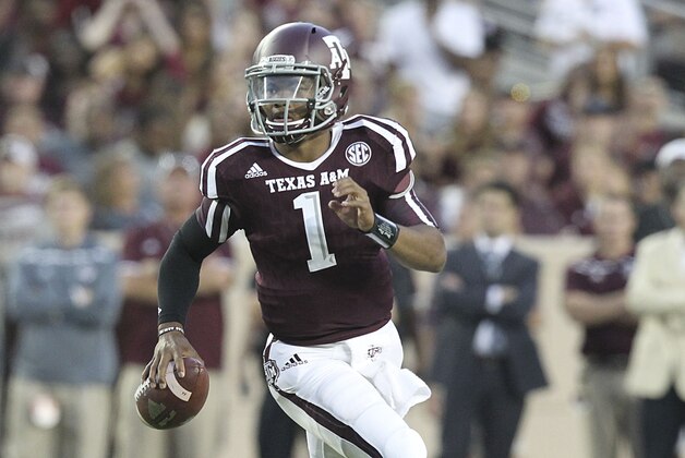 Sep 12, 2015; College Station, TX, USA; Texas A&M Aggies quarterback Kyler Murray (1) rushes against the Ball State Cardinals in the second quarter at Kyle Field. Mandatory Credit: Thomas B. Shea-USA TODAY Sports