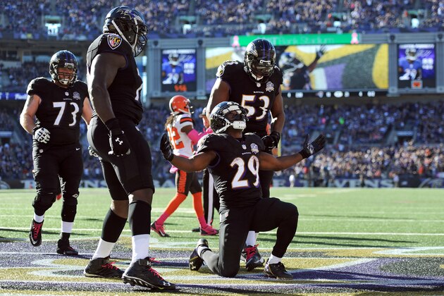 Baltimore Ravens running back Justin Forsett (29) celebrates his touchdown with teammates in the second half of an NFL football game against the Cleveland Browns, Sunday, Oct. 11, 2015, in Baltimore. (AP Photo/Gail Burton)