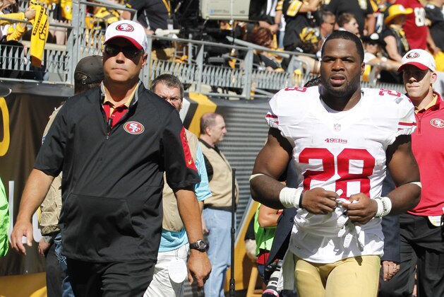 Sep 20, 2015; Pittsburgh, PA, USA; San Francisco 49ers running back Carlos Hyde (28) leaves the game with an apparent injury against the Pittsburgh Steelers during the third quarter at Heinz Field. The Steelers won 43-18. Mandatory Credit: Charles LeClaire-USA TODAY Sports