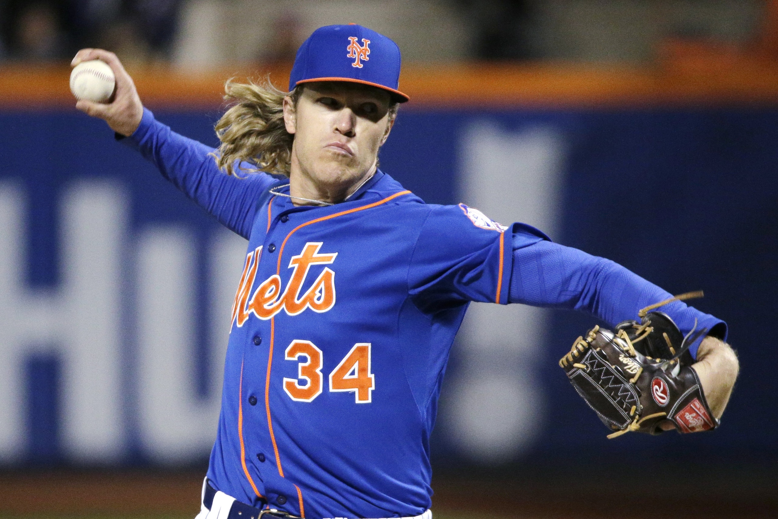 New York Mets pitcher Noah Syndergaard throws during the first inning of Game 2 of the National League baseball championship series against the Chicago Cubs Sunday, Oct. 18, 2015, in New York. (AP Photo/Julie Jacobson)