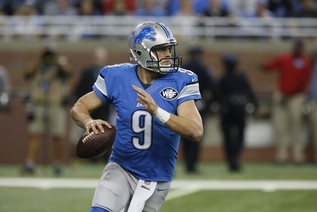 Detroit Lions quarterback Matthew Stafford (9) looks to pass against the Minnesota Vikings during the first half of an NFL football game, Sunday, Oct. 25, 2015, in Detroit. (AP Photo/Duane Burleson)
