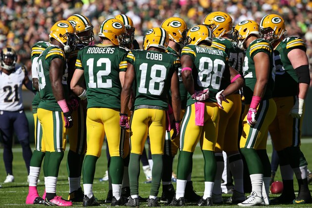 GREEN BAY, WI - OCTOBER 11:  The Green Bay Packers huddle up in the second quarter during the game against the St. Louis Rams at Lambeau Field on October 11, 2015 in Green Bay, Wisconsin.  (Photo by Jonathan Daniel/Getty Images)