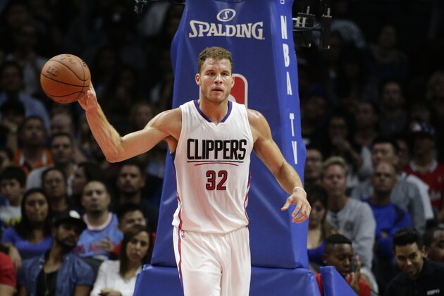 Los Angeles Clippers' Blake Griffin passes the ball during the first half of an NBA preseason basketball game against the Golden State Warriors, Tuesday, Oct. 20, 2015, in Los Angeles. (AP Photo/Jae C. Hong)