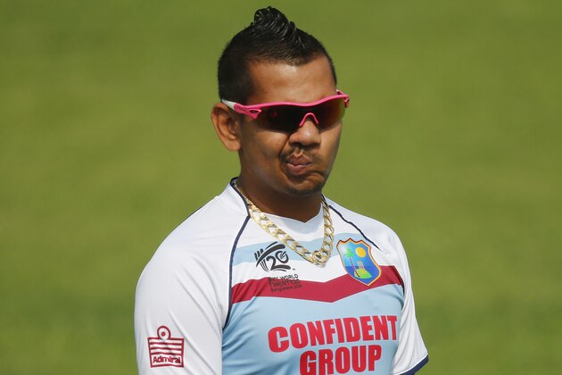 West Indies' Sunil Narine takes part in a training session ahead of their ICC Twenty20 Cricket World Cup match against Australia in Dhaka, Bangladesh, Thursday, March 27, 2014. (AP Photo/Aijaz Rahi)
