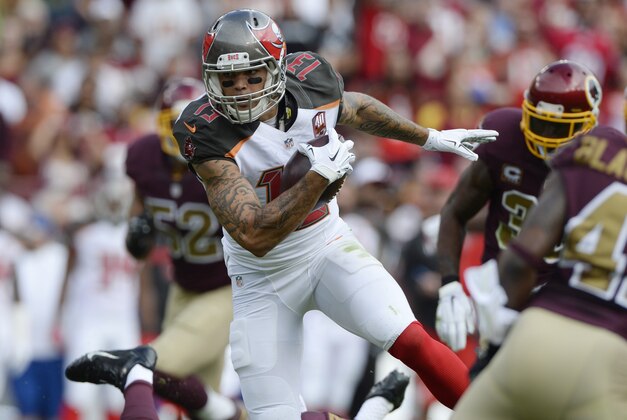 Oct 25, 2015; Landover, MD, USA; Tampa Bay Buccaneers wide receiver Mike Evans (13) runs after the catch during the first quarter against the Washington Redskins  at FedEx Field. Mandatory Credit: Tommy Gilligan-USA TODAY Sports