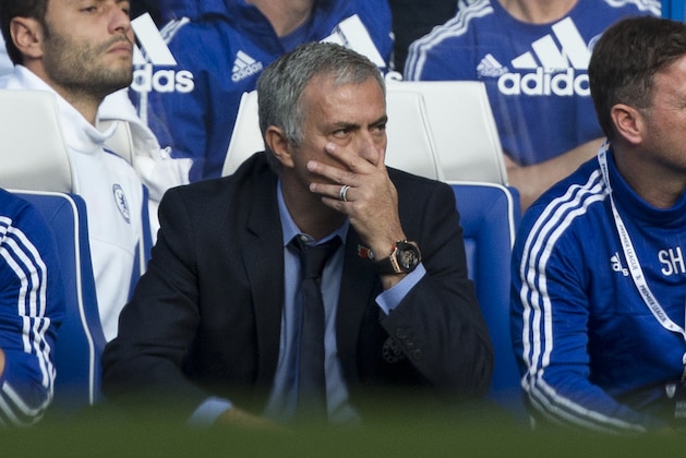 Chelsea's head coach Jose Mourinho watches during the English Premier League soccer match between Chelsea and Liverpool at Stamford Bridge stadium in London, Saturday, Oct. 31, 2015.  (AP Photo/Matt Dunham)