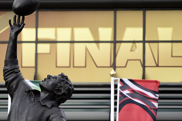A statue of rugby players reaching for a ball is pictured outside Twickenham Stadium, south-west London on October 30, 2015, on the eve of the 2015 Rugby Union World Cup final. AFP PHOTO / FRANCK FIFE        (Photo credit should read FRANCK FIFE/AFP/Getty Images)