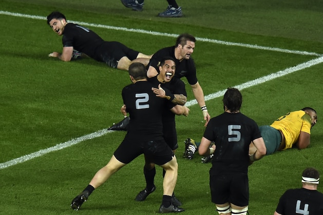 New Zealand's wing Nehe Milner-Skudder (Top L) scores his team's first try during the final match of the 2015 Rugby World Cup between New Zealand and Australia at Twickenham stadium, south west London, on October 31, 2015.  AFP PHOTO / PAUL ELLIS

RESTRICTED TO EDITORIAL USE, NO USE IN LIVE MATCH TRACKING SERVICES, TO BE USED AS NON-SEQUENTIAL STILLS        (Photo credit should read PAUL ELLIS/AFP/Getty Images)