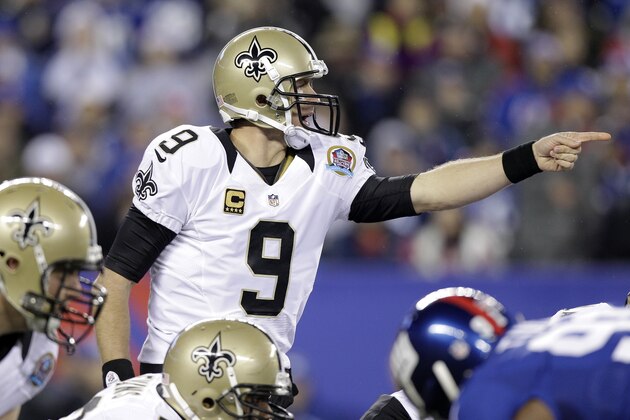 New Orleans Saints quarterback Drew Brees (9) shouts out during the first half of an NFL football game New York Giants Sunday, Dec. 9, 2012, in East Rutherford, N.J. (AP Photo/Kathy Willens)
