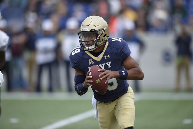 Navy quarterback Keenan Reynolds (19) during the first half of an NCAA football game against Tulane, Saturday, Oct. 24, 2015, in Annapolis, Md. (AP Photo/Nick Wass)