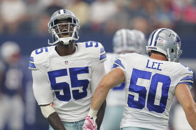 Dallas Cowboys' Rolando McClain (55) celebrates with teammate Sean Lee (50) after he sacked New England Patriots' Tom Brady during the first quarter of an NFL football game, Sunday, Oct. 11, 2015, in Arlington, Texas. (AP Photo/Brandon Wade)