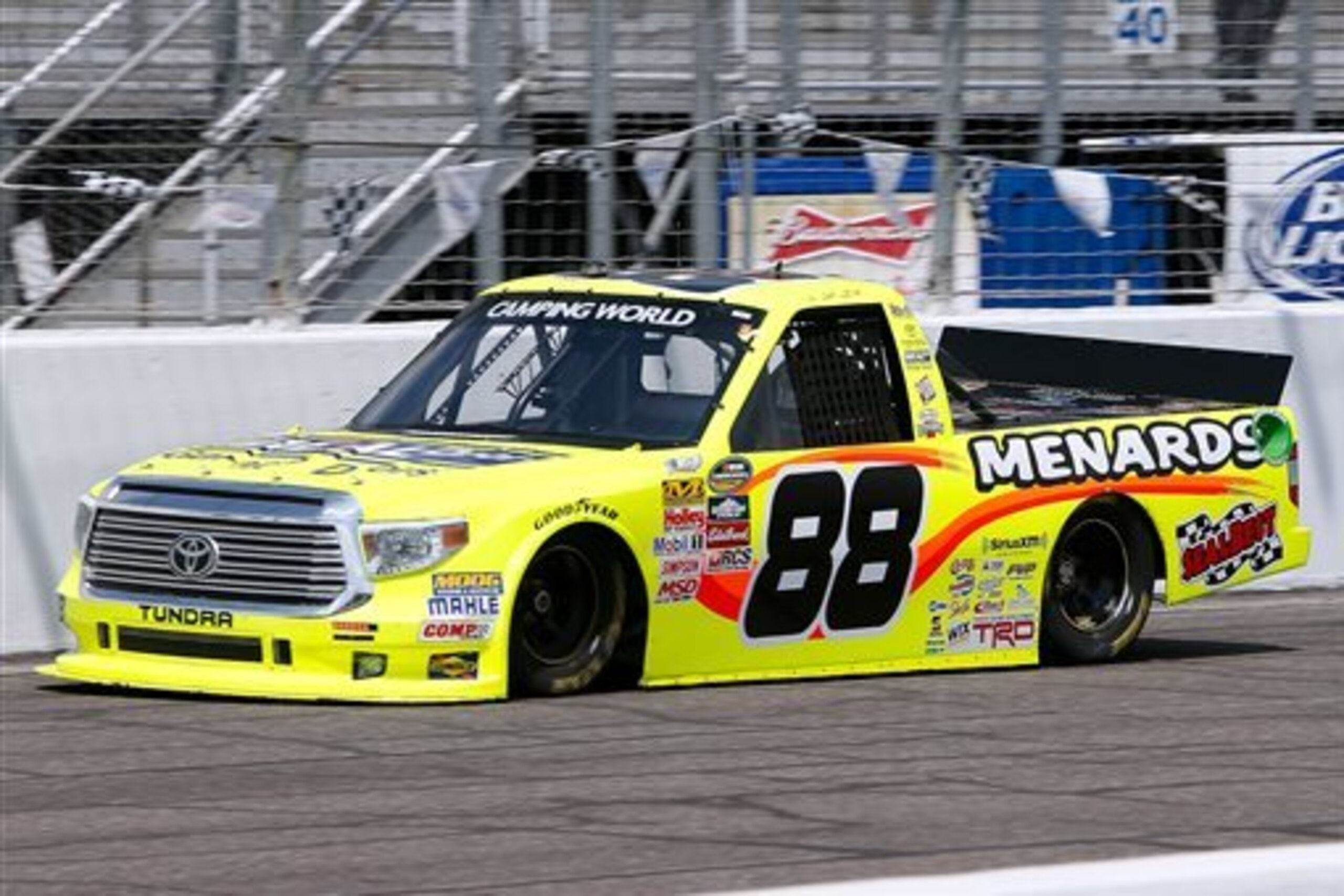 Matt Crafton (88) makes his way around the track during the final practice session for the NASCAR Truck Series auto race at Gateway Motorsports Park, Saturday, June 13, 2015, in Madison, Ill. (AP Photo/Scott Kane)