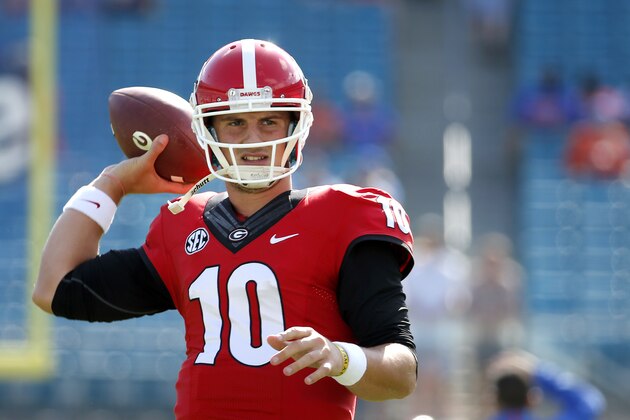 Georgia quarterback Faton Bauta (10) warms up before the start of an NCAA college football game against Florida  Saturday, Oct. 31, 2015, in Jacksonville, Fla. (AP Photo/Stephen B. Morton)