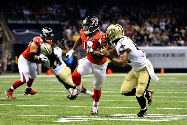 Oct 15, 2015; New Orleans, LA, USA; Atlanta Falcons wide receiver Julio Jones (11) is covered by New Orleans Saints cornerback Delvin Breaux (40) during the first half of a game at the Mercedes-Benz Superdome. Mandatory Credit: Derick E. Hingle-USA TODAY Sports