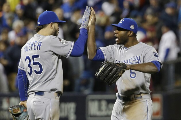 Kansas City Royals' Lorenzo Cain and Eric Hosmer celebrate after Game 4 of the Major League Baseball World Series against the New York Mets Saturday, Oct. 31, 2015, in New York. The Royals won 5-3 to take a 3-1 lead in the series. (AP Photo/David J. Phillip)
