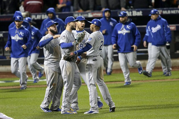 The Kansas City Royals celebrate their  win against the New York Mets in Game 4 of the Major League Baseball World Series Saturday, Oct. 31, 2015, in New York. The Royals won 5-3 to take a 3-1 lead in the series. (AP Photo/Peter Morgan)