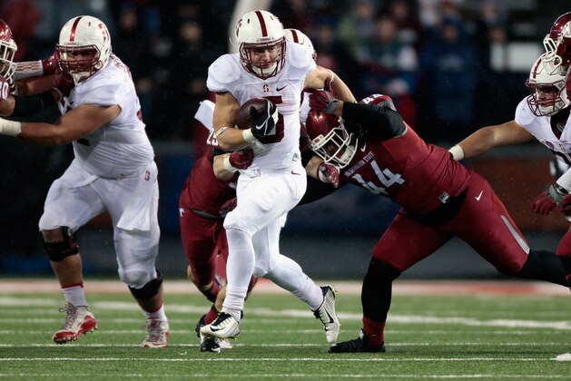 PULLMAN, WA - OCTOBER 31: Christian McCaffrey #5 of the Stanford Cardinal carries the ball against the Washington State Cougars in the first half at Martin Stadium on October 31, 2015 in Pullman, Washington. (Photo by William Mancebo/Getty Images)