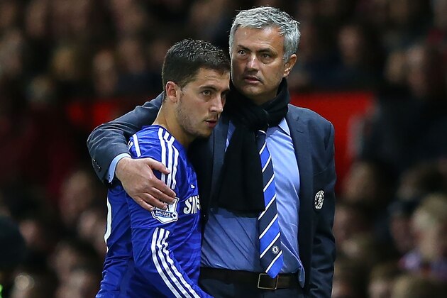 MANCHESTER, ENGLAND - OCTOBER 26:  Chelsea Manager Jose Mourinho embraces Eden Hazard during the Barclays Premier League match between Manchester United and Chelsea at Old Trafford on October 26, 2014 in Manchester, England.  (Photo by Alex Livesey/Getty Images)