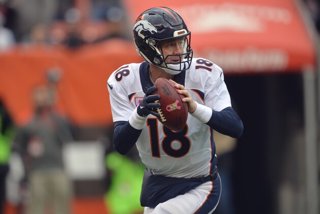Denver Broncos quarterback Peyton Manning looks to pass during an NFL football game against the Cleveland Browns, Sunday, Oct. 18, 2015, in Cleveland. Denver won 26-23 in overtime. (AP Photo/David Richard)