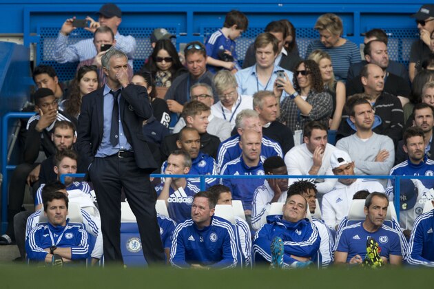 Chelsea's head coach Jose Mourinho and his bench react after they conceded their third goal during the English Premier League soccer match between Chelsea and Liverpool at Stamford Bridge stadium in London, Saturday, Oct. 31, 2015.  (AP Photo/Matt Dunham)