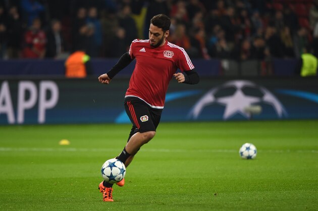 Leverkusen's midfielder Hakan Calhanoglu warms up prior to the UEFA Champions League Group E football match between Bayer Leverkusen and AS Roma at the BayArena in Leverkusen, western Germany on October 20, 2015. AFP PHOTO / PATRIK STOLLARZ (Photo credit should read PATRIK STOLLARZ/AFP/Getty Images) Leverkusen's midfielder Hakan Calhanoglu warms up prior to the UEFA Champions League Group E football match between Bayer Leverkusen and AS Roma at the BayArena in Leverkusen, western Germany on October 20, 2015. AFP PHOTO / PATRIK STOLLARZ (Photo credit should read PATRIK STOLLARZ/AFP/Getty Images)