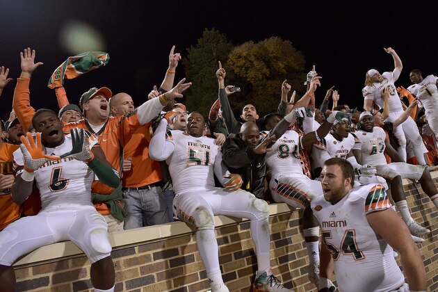 DURHAM, NC - OCTOBER 31: Miami Hurricanes players and fans celebrate after a win against the Duke Blue Devils at Wallace Wade Stadium on October 31, 2015 in Durham, North Carolina. Miami won 30-27 on a last-second touchdown. (Photo by Grant Halverson/Getty Images)