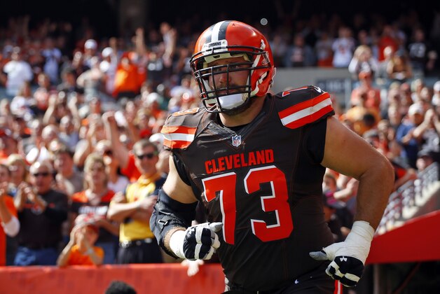 Cleveland Browns tackle Joe Thomas (73) comes out during player introductions before football game against the Oakland Raiders, Sunday, Sept. 27, 2015. (Jeff Haynes/AP Images for Panini)