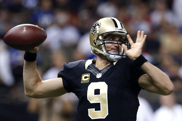 New Orleans Saints quarterback Drew Brees (9) passes in the first half of an NFL football game against the New York Giants in New Orleans, Sunday, Nov. 1, 2015. (AP Photo/Jonathan Bachman)